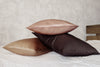 beige, pink and brown pillows
