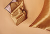 gold pillowcase in a giftbox